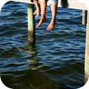 Water Splashing Against Dock